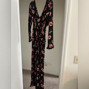 Takara women’s long sleeve floral jumpsuit in small